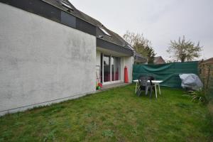 Vonkajšia záhrada v ubytovaní Charmante maison à 100 m de la plage du Crotoy