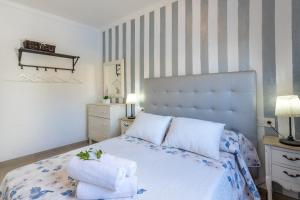 Ένα ή περισσότερα κρεβάτια σε δωμάτιο στο Sa Vela de Ca Na Felipa