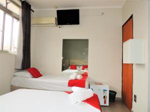 Katil atau katil-katil dalam bilik di Hotel Vila Prudente São Paulo - Fácil acesso Expo São Paulo e Museu Ipiranga