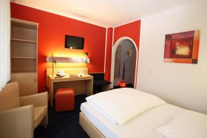 Postel nebo postele na pokoji v ubytování Hotel Silberhorn
