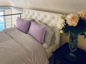Säng eller sängar i ett rum på Ultimate Dream Apartment