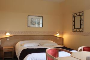 Postel nebo postele na pokoji v ubytování Hotel Des Bains