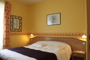 Postel nebo postele na pokoji v ubytování Hotel Des Bains