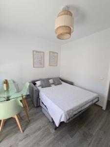 Posteľ alebo postele v izbe v ubytovaní COLON Nerja