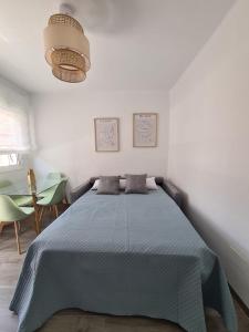 Posteľ alebo postele v izbe v ubytovaní COLON Nerja