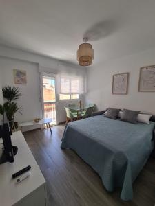 Posteľ alebo postele v izbe v ubytovaní COLON Nerja