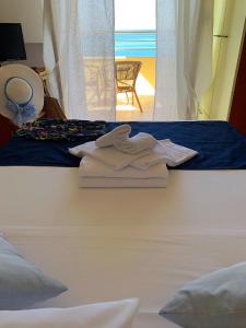 Postelja oz. postelje v sobi nastanitve Hotel Panoramico