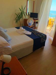 Postel nebo postele na pokoji v ubytování Hotel Panoramico