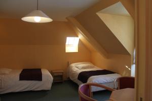 Postel nebo postele na pokoji v ubytování Hotel Des Bains
