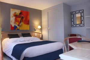 Postel nebo postele na pokoji v ubytování Hotel Des Bains