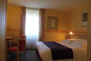 Postel nebo postele na pokoji v ubytování Hotel Des Bains