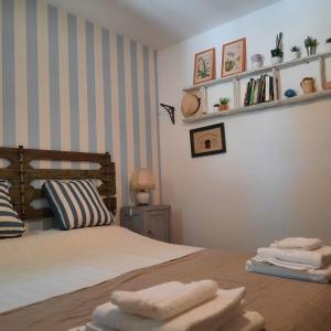 Letto o letti in una camera di TRULLO PIETRAPOESIA