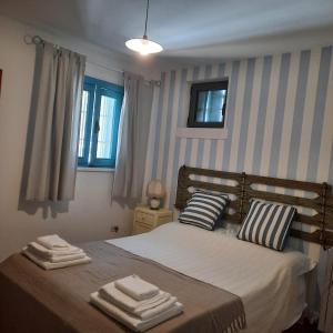 Letto o letti in una camera di TRULLO PIETRAPOESIA