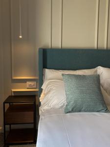 A bed or beds in a room at NoOne Tropea Guesthouse