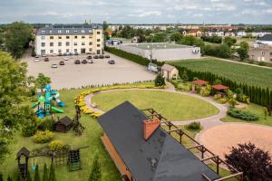 an aerial view of a park with a playground at Hotel Austeria Conference & Spa in Ciechocinek