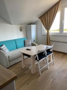 A seating area at Lovely Аpartment in IGLIKA 2,Borovets