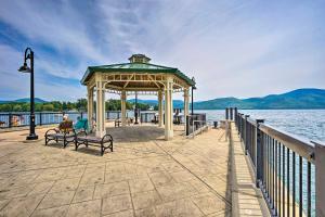 a gazebo on a pier next to the water at Updated Bolton Home with Fire Pit! in Bolton