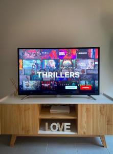 TV a/nebo společenská místnost v ubytování Apartment Rosario in Malaga center