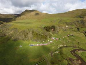 an aerial view of a golf course on a mountain at Hacienda Yanahurco in Del Salitre