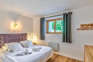 Posteľ alebo postele v izbe v ubytovaní Appartement Vue Montagnarde - Welkeys