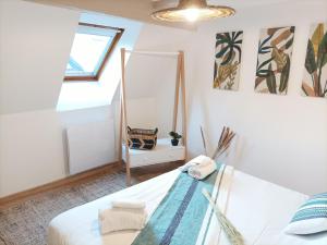 Voodi või voodid majutusasutuse Centre - L'escapade toas