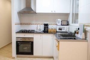 Η κουζίνα ή μικρή κουζίνα στο Apartamento del Pla +15 φωτογραφίες