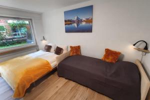 Postel nebo postele na pokoji v ubytování Phoenix Studio - Haus Astral - Zermatt