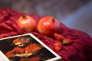 a picture of a man with strawberries and apples at Cadena Gallery Apartments Matejko in Krakow