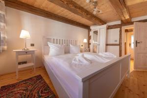 Una cama o camas en una habitación de Villa-Duck-Dich
