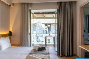 Posteľ alebo postele v izbe v ubytovaní Sirius luxury Boutique
