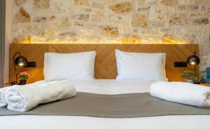 Posteľ alebo postele v izbe v ubytovaní Sirius luxury Boutique