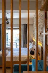 Posteľ alebo postele v izbe v ubytovaní Sirius luxury Boutique