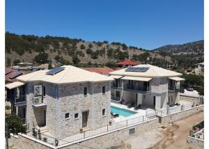 an aerial view of a house with a pool at Sirius luxury Boutique in Sivota
