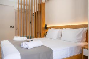Posteľ alebo postele v izbe v ubytovaní Sirius luxury Boutique