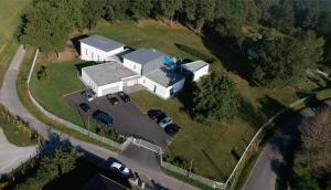 an aerial view of a house with a garage at Domaine Georges V in Saint-Junien
