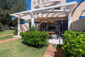 Zahrada ubytování Apartamentos Playa Feliz