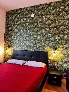 A bed or beds in a room at Casa di Charlie