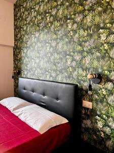 A bed or beds in a room at Casa di Charlie Még 20 kép