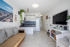 Kuchyň nebo kuchyňský kout v ubytování Apartamentos Playa Feliz