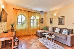 TV a/nebo společenská místnost v ubytování daMonte – Apartments and rooms