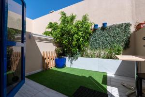 Zahrada ubytování Apartamentos Playa Feliz