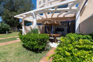 Zahrada ubytování Apartamentos Playa Feliz