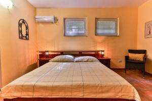 Postel nebo postele na pokoji v ubytování daMonte – Apartments and rooms