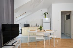 Telewizja i/lub zestaw kina domowego w obiekcie Apartament Słoneczny 7