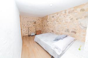A bed or beds in a room at Casas Rurales Sagasta