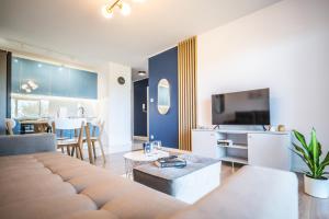 Μια τηλεόραση ή/και κέντρο ψυχαγωγίας στο Apartament Belezza