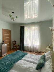 Postel nebo postele na pokoji v ubytování Hestia