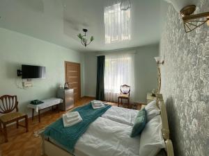 Postel nebo postele na pokoji v ubytování Hestia