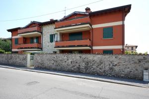 a house on the side of a street at Stupenda mansarda dotata di tutti i comfort! in Brescia