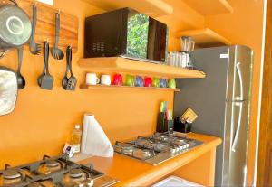 Kuchyň nebo kuchyňský kout v ubytování Ku kuk Glamping